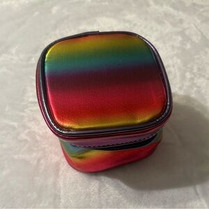 Nordstrom small rainbow jewelry travel case.